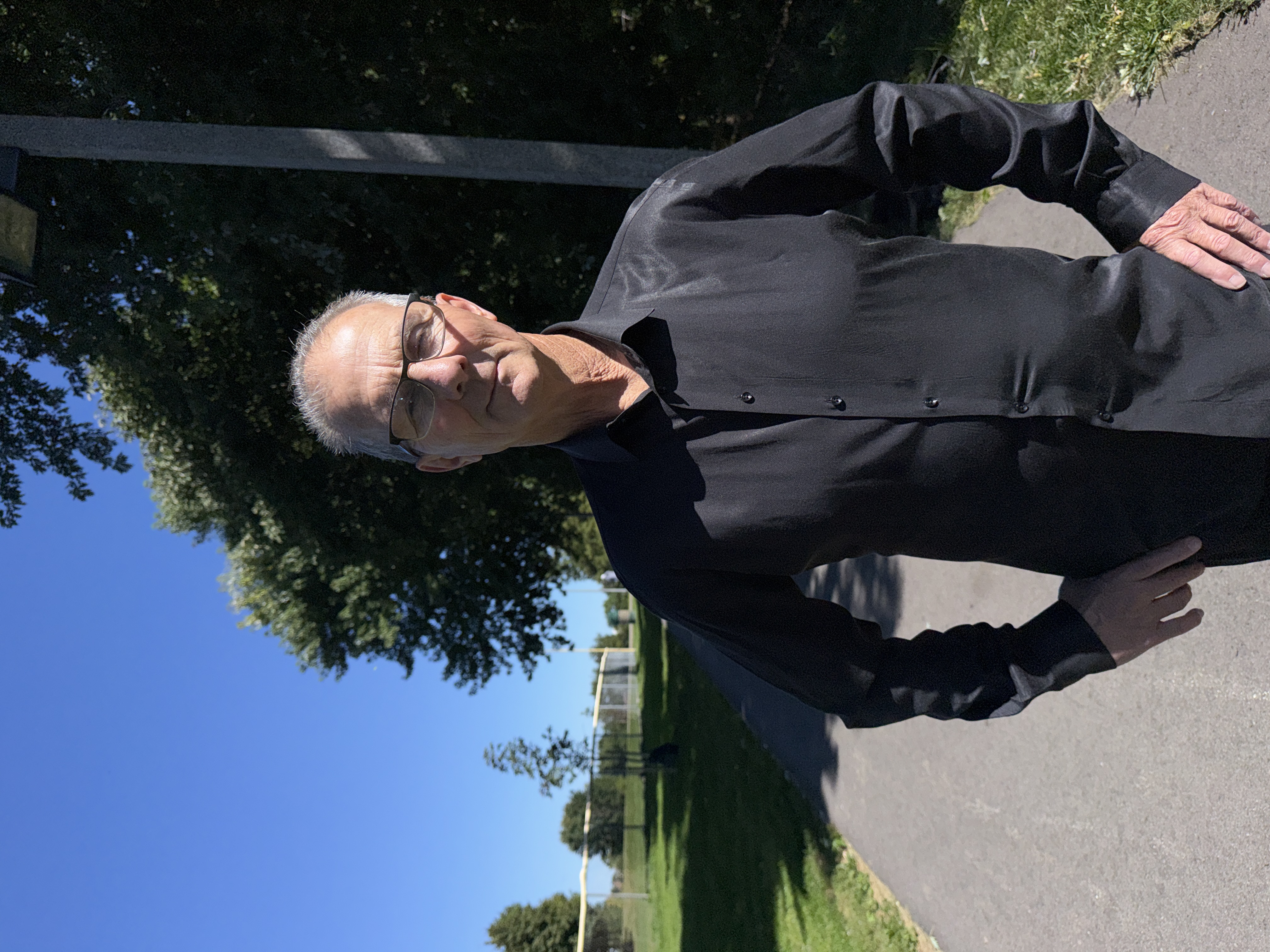 George Fiddick standing on a path at Lions Park